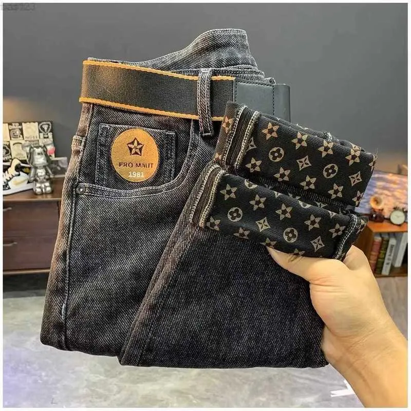 Mäns jeans män jeans designer svart tryckt jeans mäns trendiga märke 2023 sommar ny ins koreansk version trend smala passande små benbyxor för män ly8