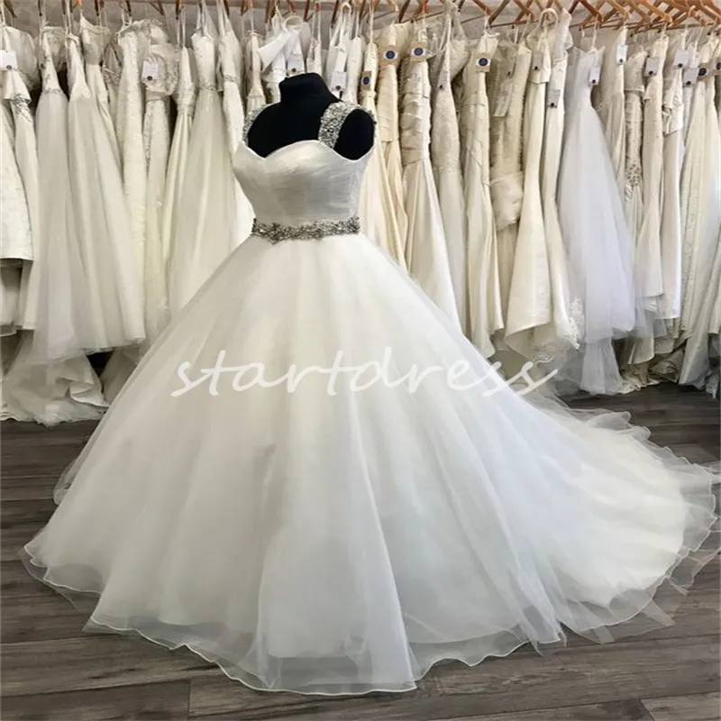 Perlenträger Ballkleid Brautkleid Prinzessin Weiß Bodenlang Tüll Kristall Schärpe Land Kirche Brautkleider 2024 Königin Puffy Robe De Mariee Vestido Casamento