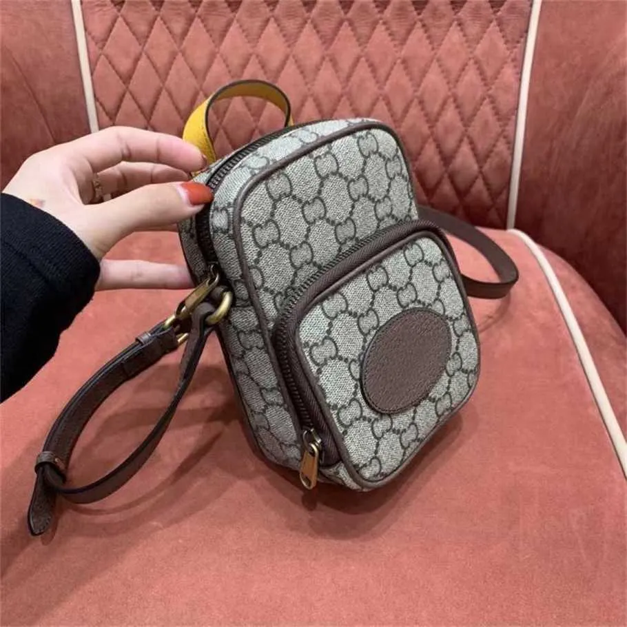 Numer 5821 Oryginalny skórzany tygrys TIGER TELEFON MOBLE Crossbody Małe nowe letnie popularne mini ramię wszechstronna torba damska