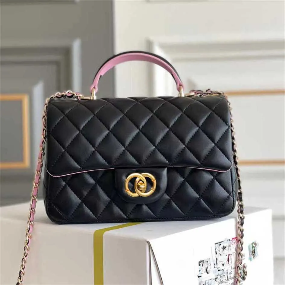 Xiangfeng Bolsa feminina de couro genuíno com mini alça e aba pequena de pele de carneiro em dois tons Bolsa de pulso de ombro único crossbody com 80% de desconto nos pontos de venda slae