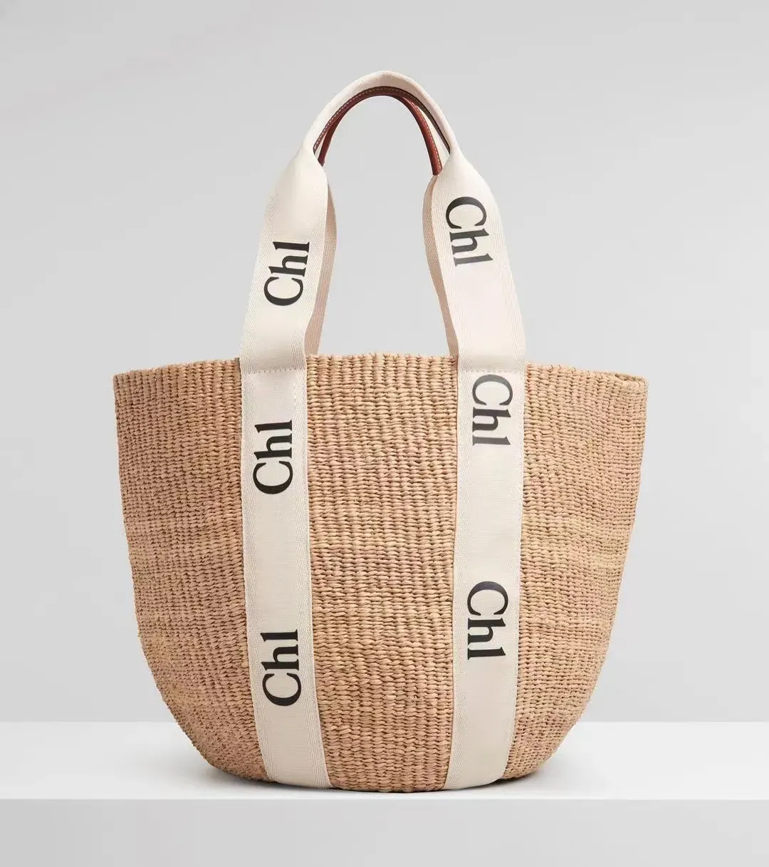 Mode Sac de seau de luxe Voyage Femmes Hommes Shopping Designer Les sacs fourre-tout Embrayage Sac à bandoulière Sac à main Sac à main étanche Panier Weave Sac de plage