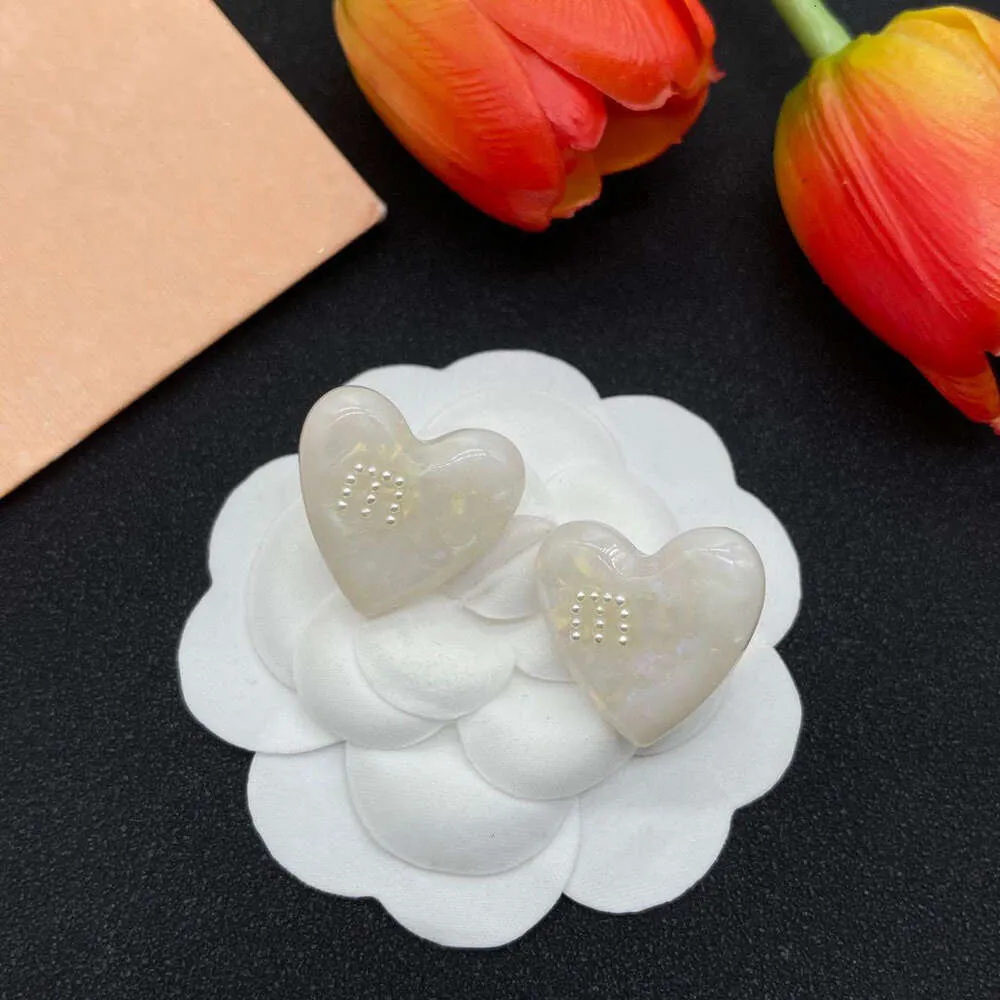 Bijoux de créateur Miui Miui boucles d'oreilles femmes amour ambre Mimi perle boucle d'oreille nouvelle résine français exagéré oreille accessoires pour les femmes