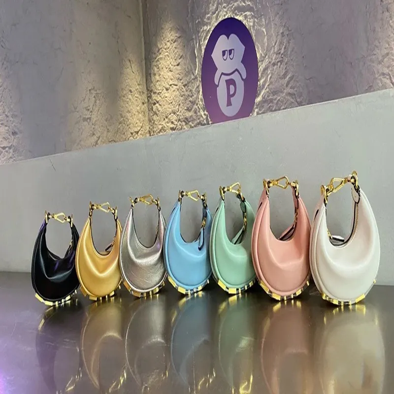 Designer Mini Bag Vintage Bag Hobo Wrist Bag Half Moon Zip Fästning Golden Metal Letter Luxurys Small French Face Women