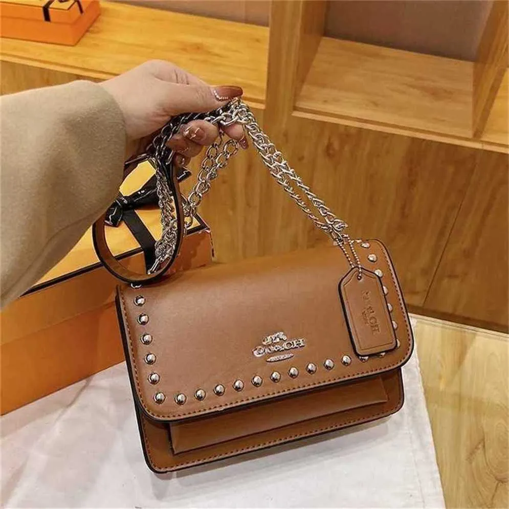 2023 New Quality Fashion Single Shoulder Diagonal Straddle Chain Rivet High Appearance Women's Underarm Small Square Bag 70% off outlet online sale