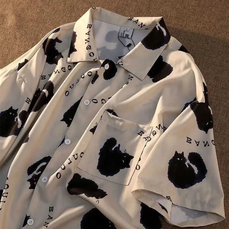 Женские блузки Рубашки Рубашка Cat Graffiti Укороченный топ в уличном стиле Женские летние женские рубашки 2023 Крутая блузка с коротким рукавом Корейская рубашка для женщин YQ240120