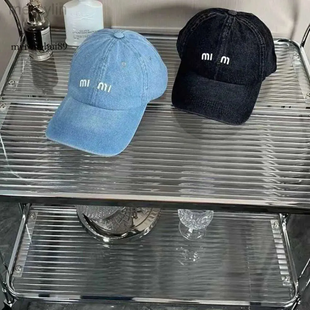 miui miui gorra de béisbol Sombrero de diseñador Lavado con agua Denim Azul Béisbol con ala curva Protector solar Edición versátil Gorra usada para hombres y mujeres Negro