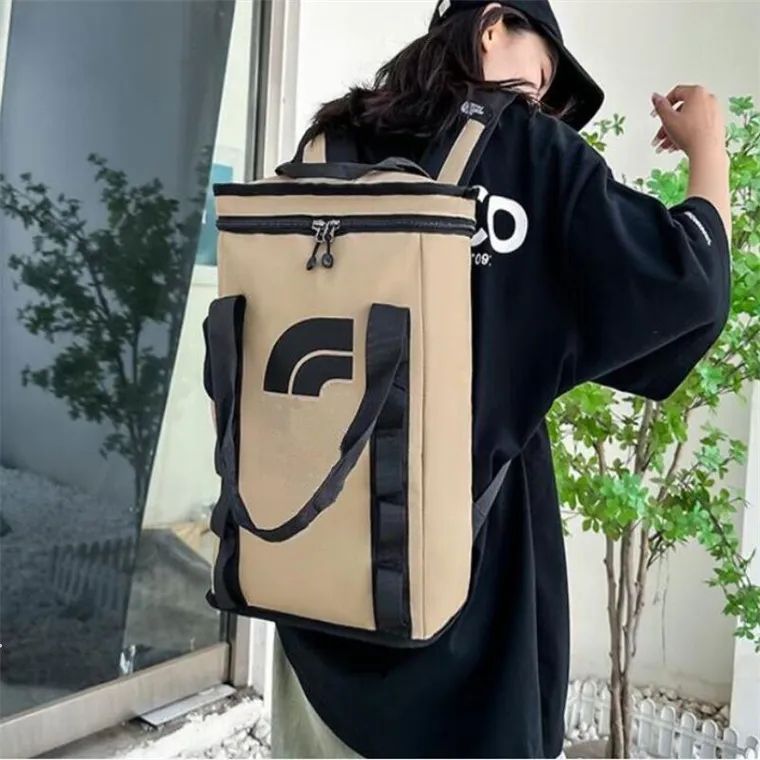 ファッションノースデザイナーアウトドアバックパック防水ガールボーイスクールバッグ男性女性旅行バッグフェイステッドハンドバッグラップトップバッグ