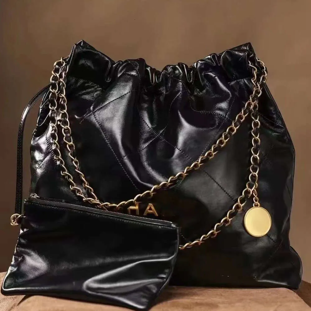 Borsa firmata 2024 nuova borsa spazzatura borsa a tracolla da donna borsa shopping tendenza moda borsa da donna catena borse mm