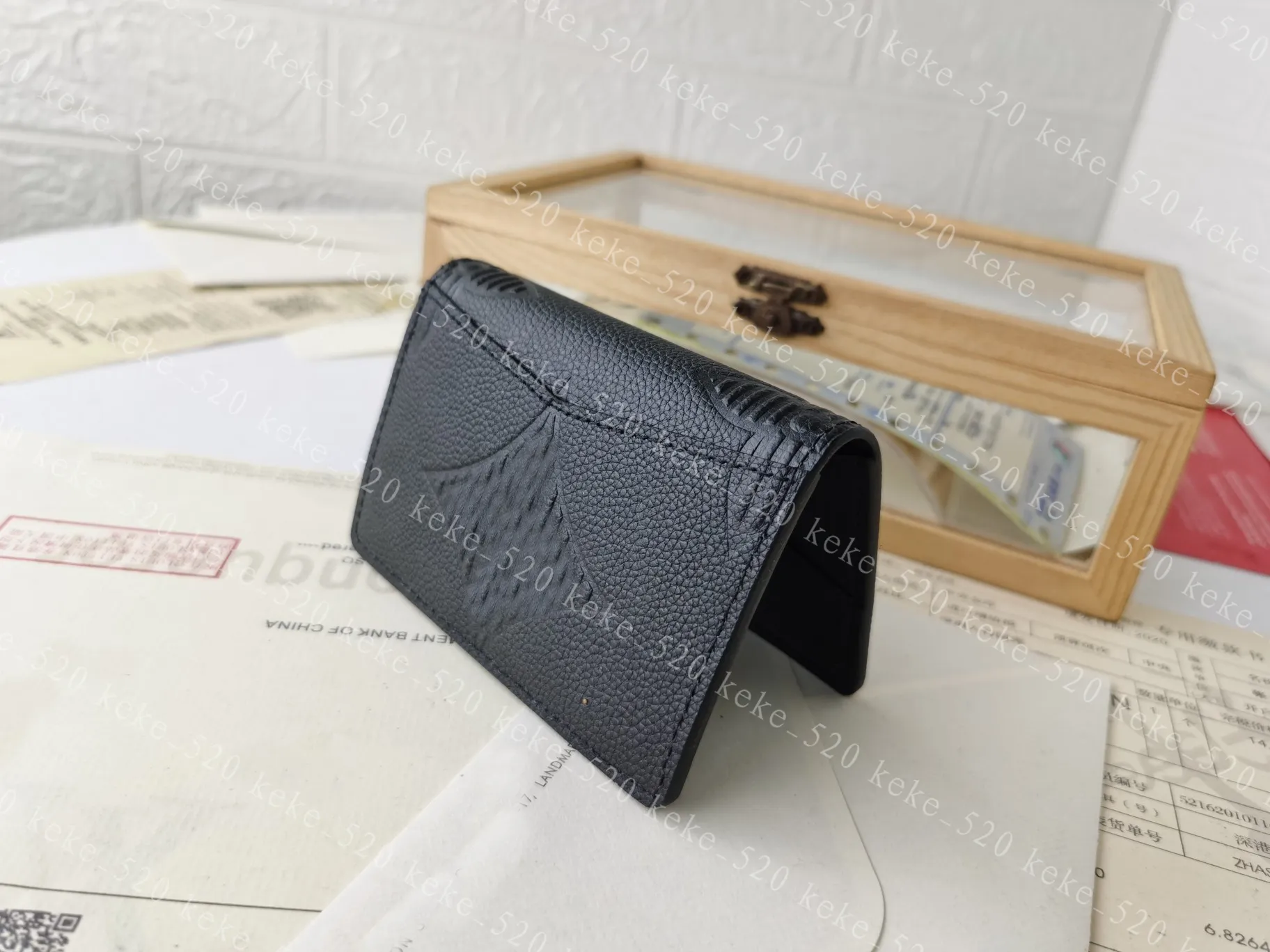 Designer plånböcker kvinnors läderkoppling män lyxiga plånbok pochette reser verklig design vertikal brazza handväska ny spaper m80038