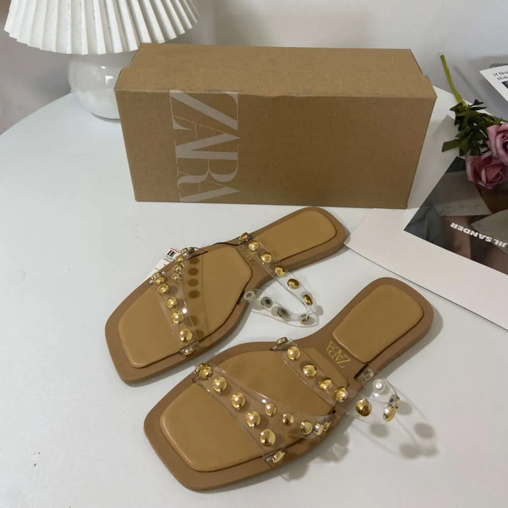 ZA New 2023 Summer Spanish Flat Outerwear Sandals with Open Toe Rivets and Transparent Straight Line Slippers for Women