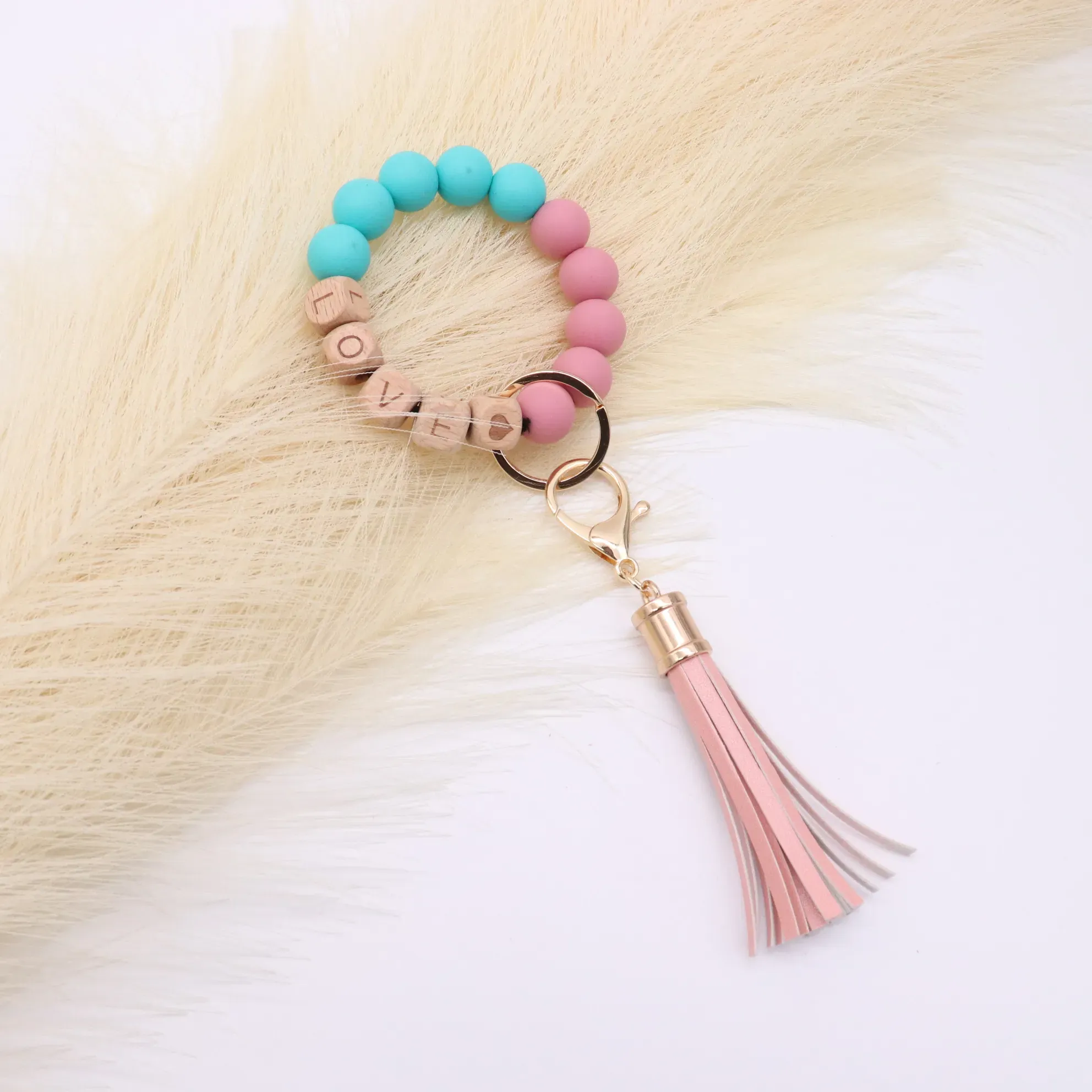 Wholesale foreign trade food grade silicone beads wrist keychain alloy cap PU leather tassel keychain female multicolor optional