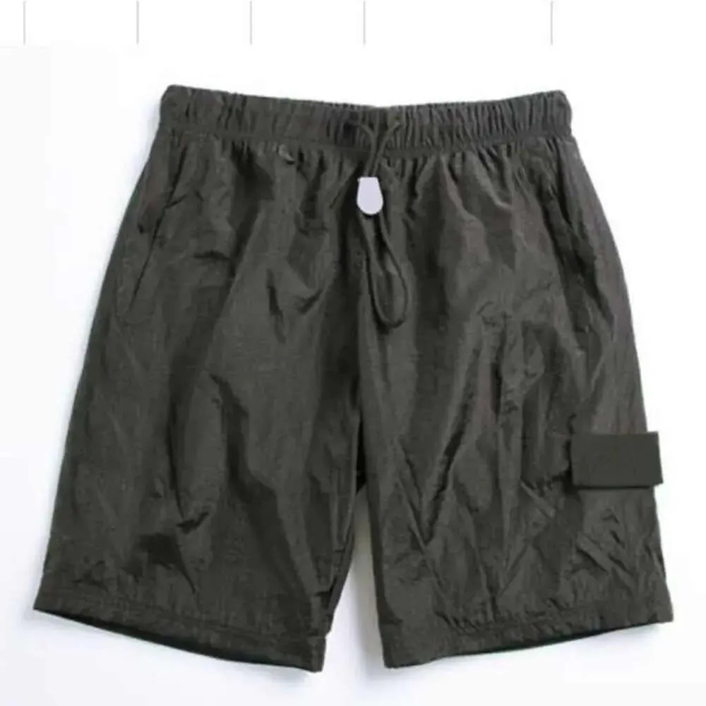 Praia verão shorts masculino calças curtas moda correndo solto processo de lavagem de secagem rápida de tecido puro na moda casual hip-hop ins pedras é 61