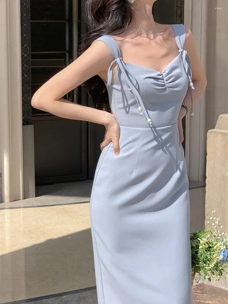 Sukienki zwyczajne sukienki midi kobiety lato 2024 elegancka moda słodka mleevess plażowa impreza spaghetti pasek seksowne kobiece ubrania