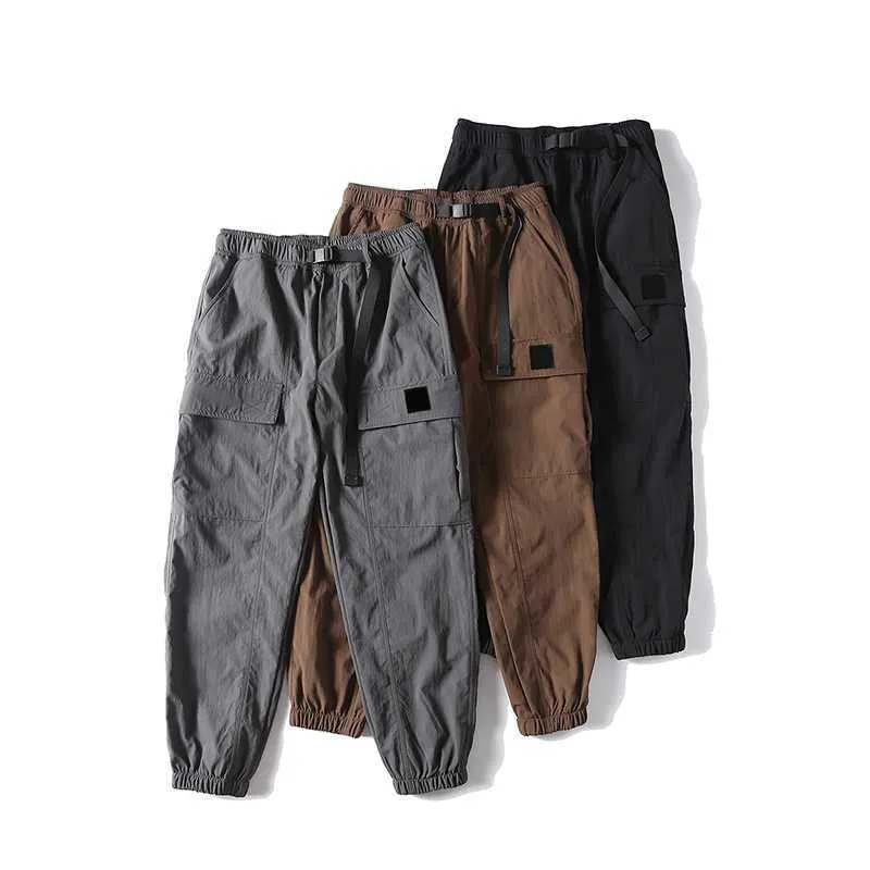 Calças masculinas roupas de grife a melhor qualidade calças de pedra calças masculinas calças femininas calças de carga causal inverno outwear calças de grandes dimensões senhora calça com emblema asiático