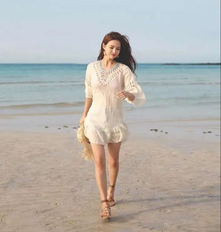 Partihandel varm försäljning kvinnors sex mode nya strandklänningar avslappnade badkläder solskyddsmedel bomullsklänning handkrok ihålig blus