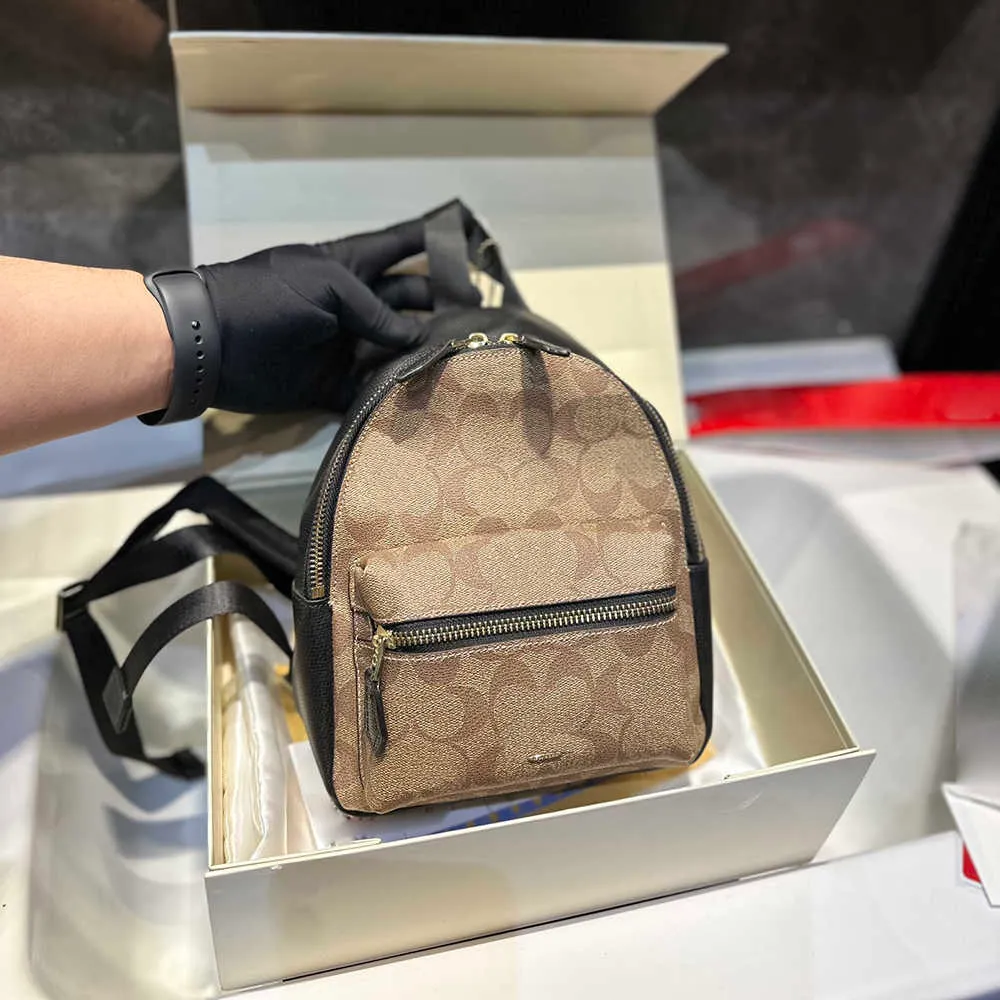 DHgate.com:Cbag Luxurious Leather Travel Backpack & Handbag for Men ...