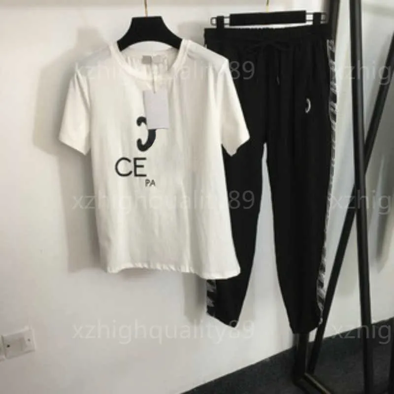 Designer Deux Pièces Ensemble Womentracksuit Femmes Survêtement Jogging Costume Ensembles À Manches Courtes T-shirt Blanc Pantalon Décontracté Costume De Sport D'été 2 Pièces Ensemble Vêtements Pour Femmes