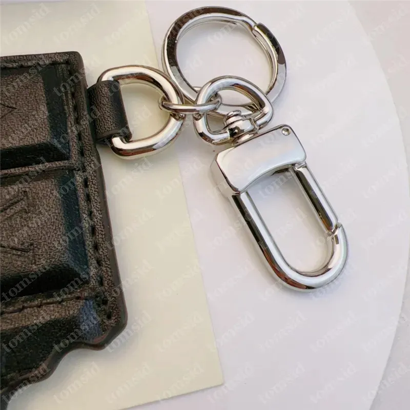 Designer Keychain Luxury Bag Charme voor dames bar beeldje lederen sleutelhanger klassieke letters roestvrij staal mode
