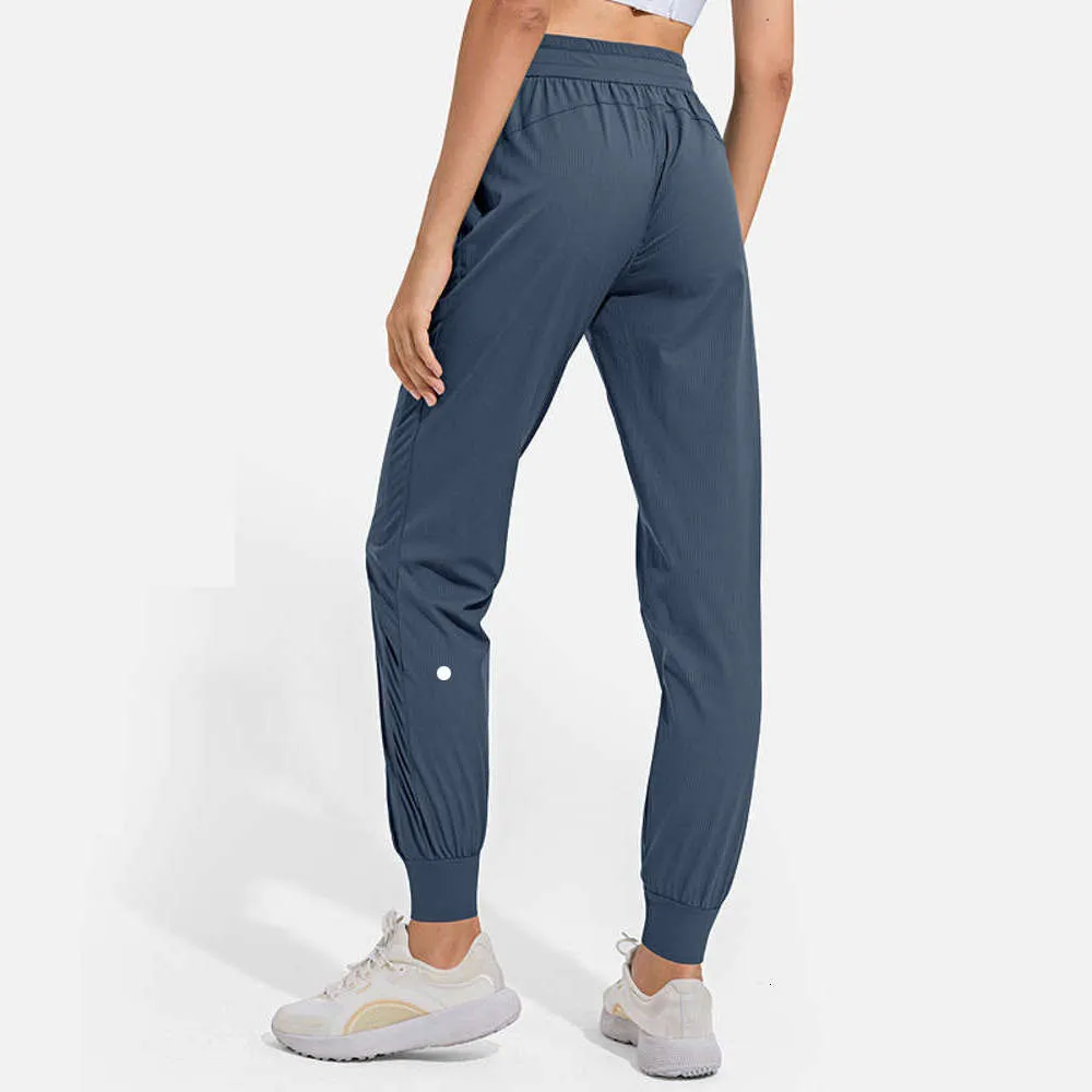 LuLu Align Luluemon yogabroek met dames naakt aanvoelende stof losse pasvorm Sport Actieve rug taille Lounge Jogger Fitnesslegging met twee zijzakken lululelemen