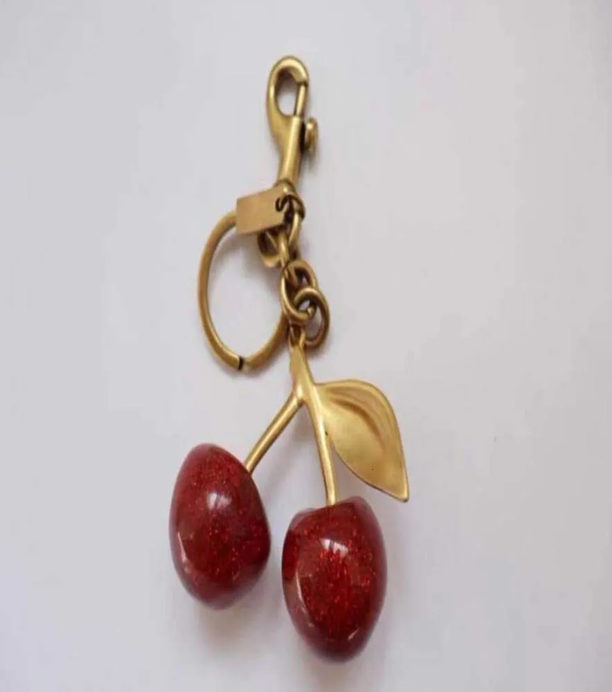 Keychain cherry style red color Chapstick Wrap Lipstick Cover Team Lipbalm Cozybag parts mode fashion91267821