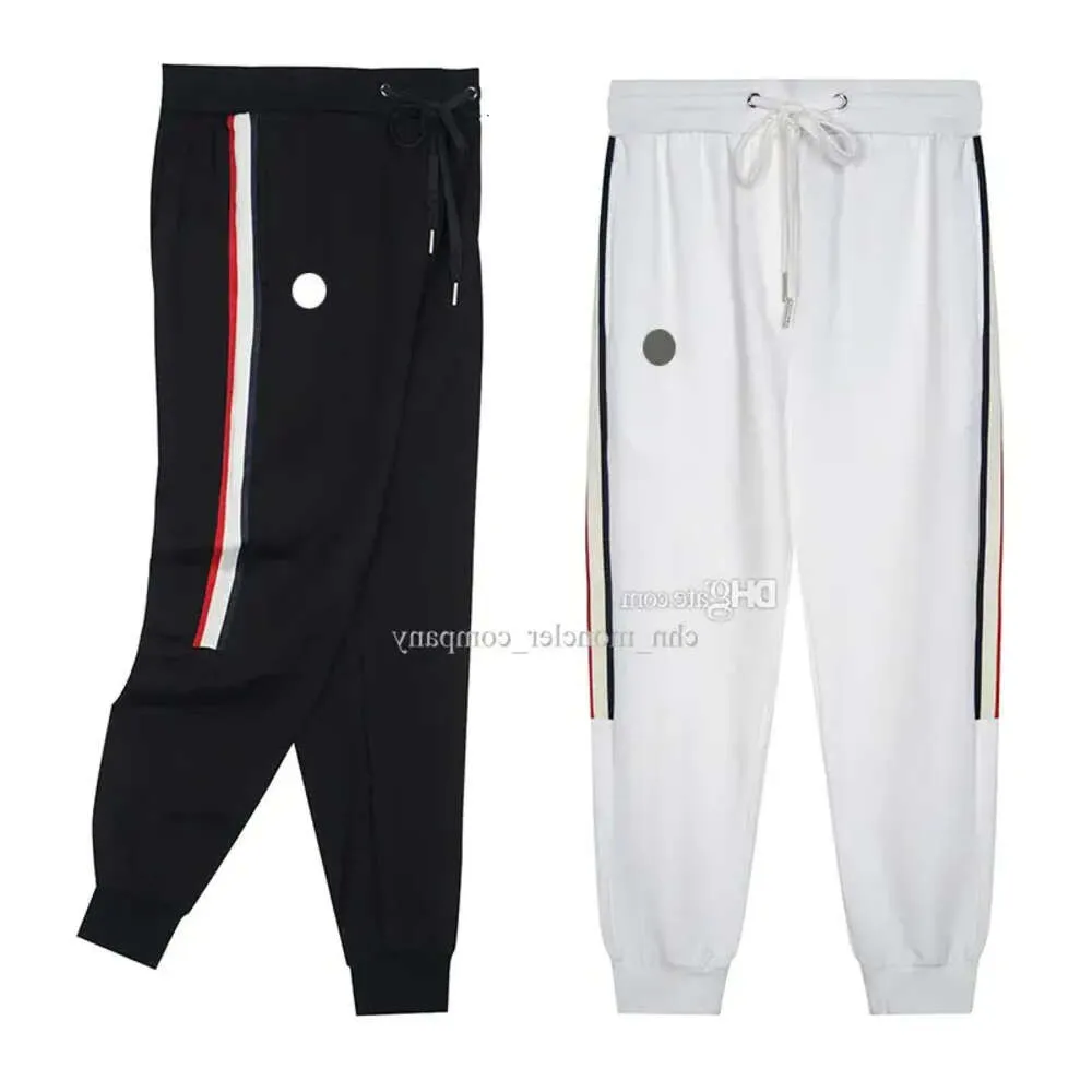 Färgglada ränder män casual byxor varumärkesdesigner mens joggar designer pant män klassisk ficklogo byxa storlek m-xxl 36