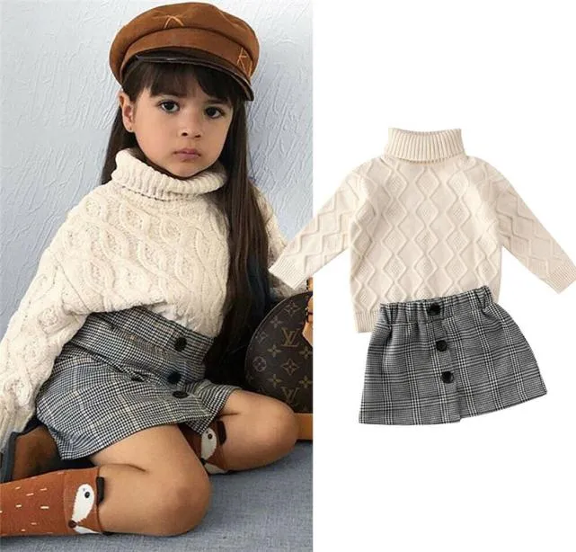 2020 Nouvelle Mode Automne Hiver Enfants Bébé Filles Vêtements Ensembles Col Roulé Pull En Tricot Hauts À Carreaux Imprimé Mini Jupe Tenue Chaude 27Y T7301775