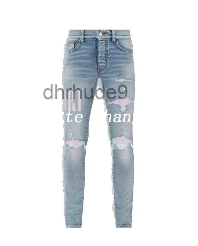 Designer män jeans delade byxor mens smala fit casual hip hop knappbyxa män elastiska kvinnor hål lila jean true lyx 765635377 r8d1