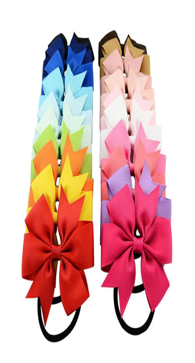 Baby flickor bow pannband 20 färger turban fast färg elasticitet tillbehör mode barn boutique bowknot band rn80236387029