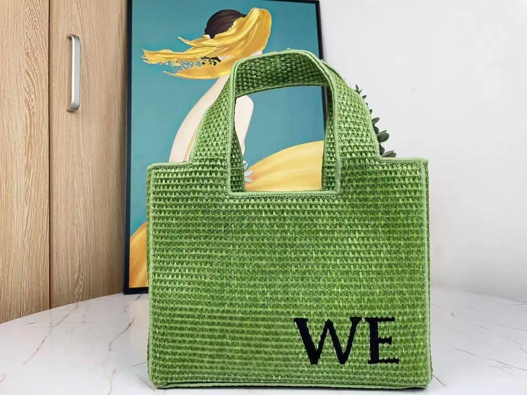 Bolsa de viaje de verano de vacaciones de alta calidad Bolsas de playa de hierba Bolso de paja para mujer Monedero Bordado Letra Totes tejidos a mano Compras de paja 4 colores hdmbags2024