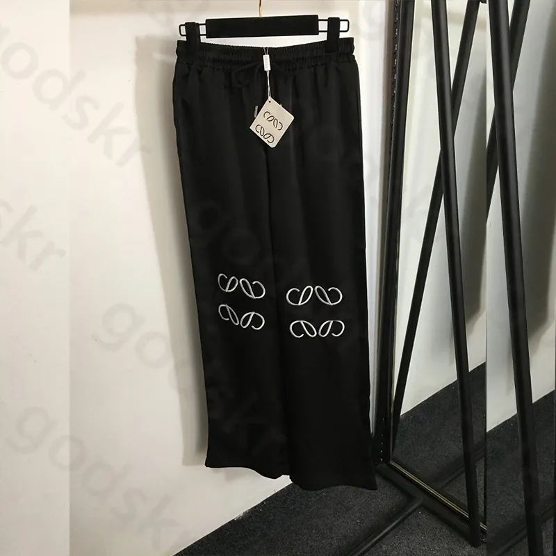 Pantaloni casual a vita elastica Pantaloni larghi ricamati da donna Pantaloni sportivi alla moda Pantaloni sportivi da corsa fitness