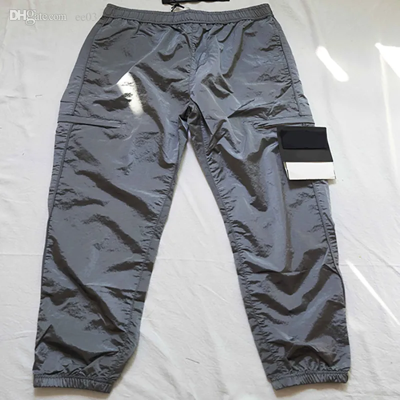 Projektanci marki Stone Pant Metal Nylon Spit Panting Pocket Oddychana haftowana odznaka swobodne spodnie Grapestone odblaskowe spodnie wyspowe CP 284