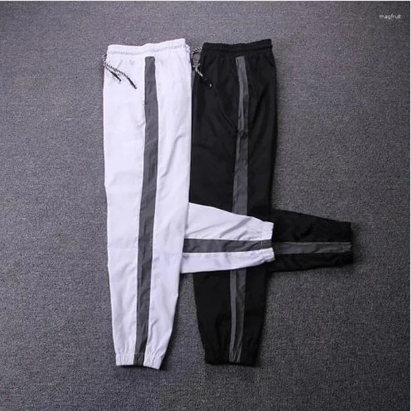 Calças masculinas calça reflexiva mens 2024 hip hop casual corredores homens sweatpants rua moda calças compridas para casais
