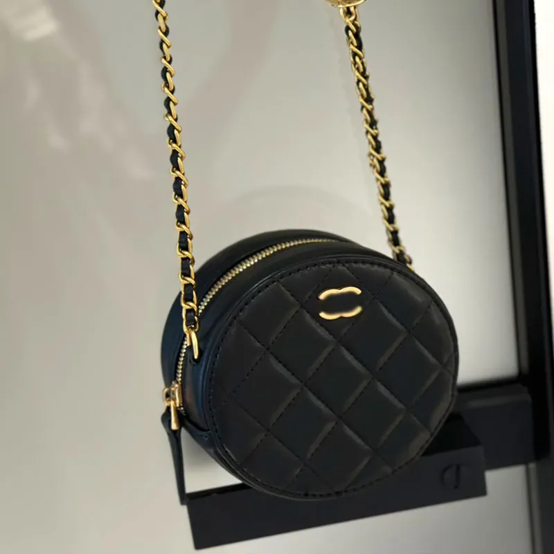 Fashion Designer bag Oblique back hand belt multi-back method size10cm mini with small gold ball round bag Hand-held crossbody bag