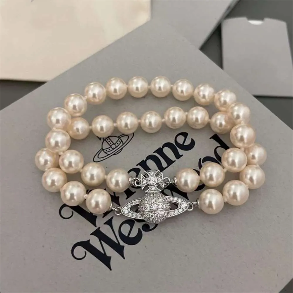 Дизайнер Viviane Westwood High Editionempress Dowager Bracelet Bracelet Элегантный двойной слой жемчужина, полная алмазной планеты, магнитная пряжка