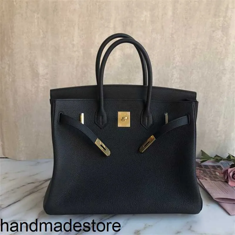 Borse originali Platino Borsa classica semplice e versatile Grana di litchi Togo Pelle di mucca Borsa da donna con fibbia portatile Borsa da sposa in pelle Borsa da sposa