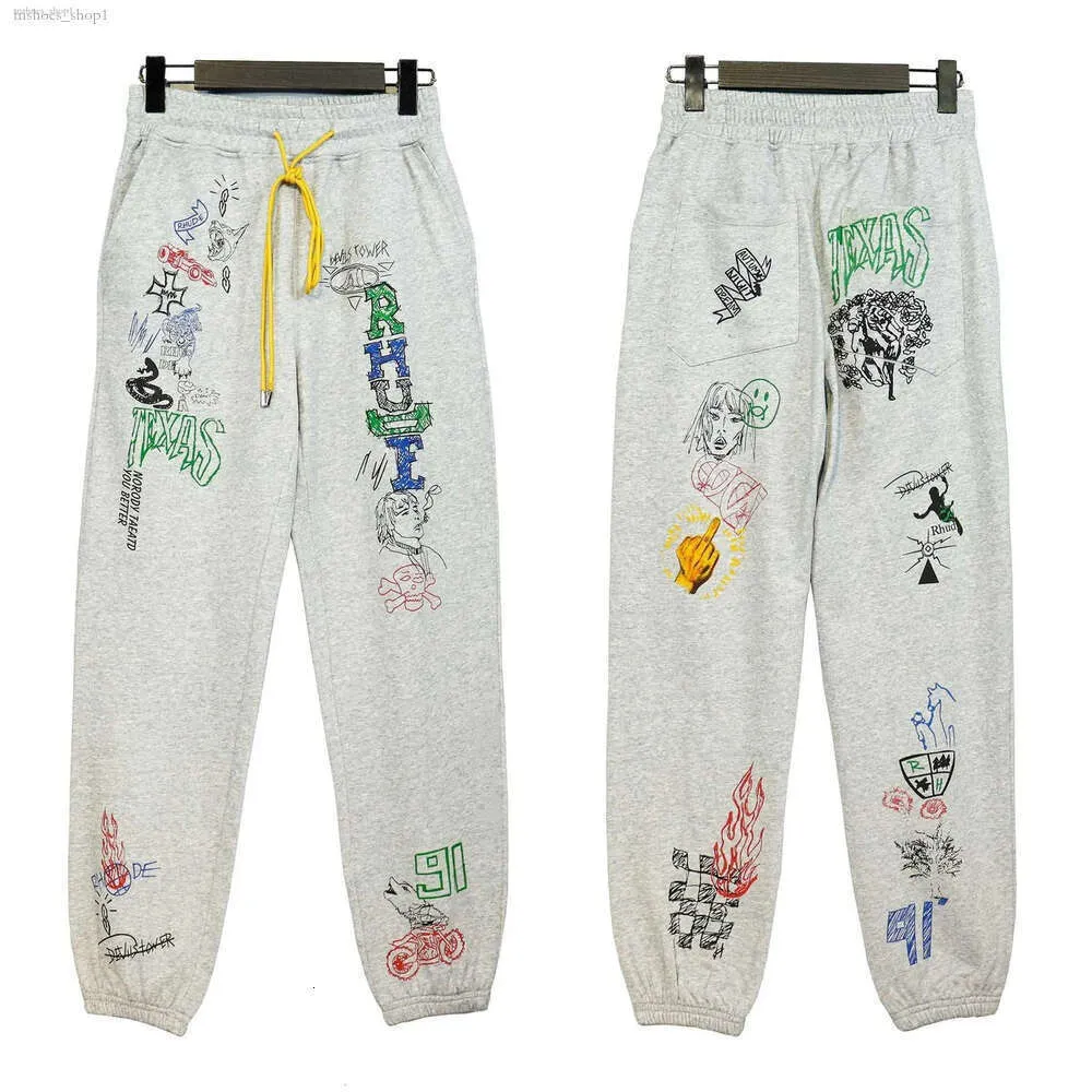 Calças masculinas da marca versão correta 2022 início do outono moda rhudes principal pintado à mão graffiti streetwear alta rua calças casuais le