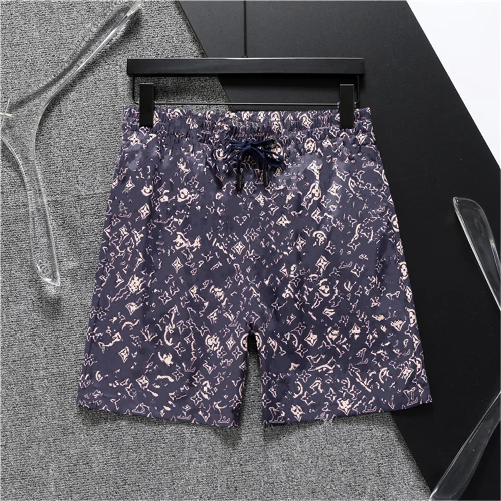 Pantaloncini di marca Pantaloncini da uomo estivi Pantaloncini da surf firmati Moda Sport casual Boxer allentato Nuoto Asciugatura rapida Costumi da bagno Stampa Nero Bianco Uomo Pantaloni da spiaggia Sxl