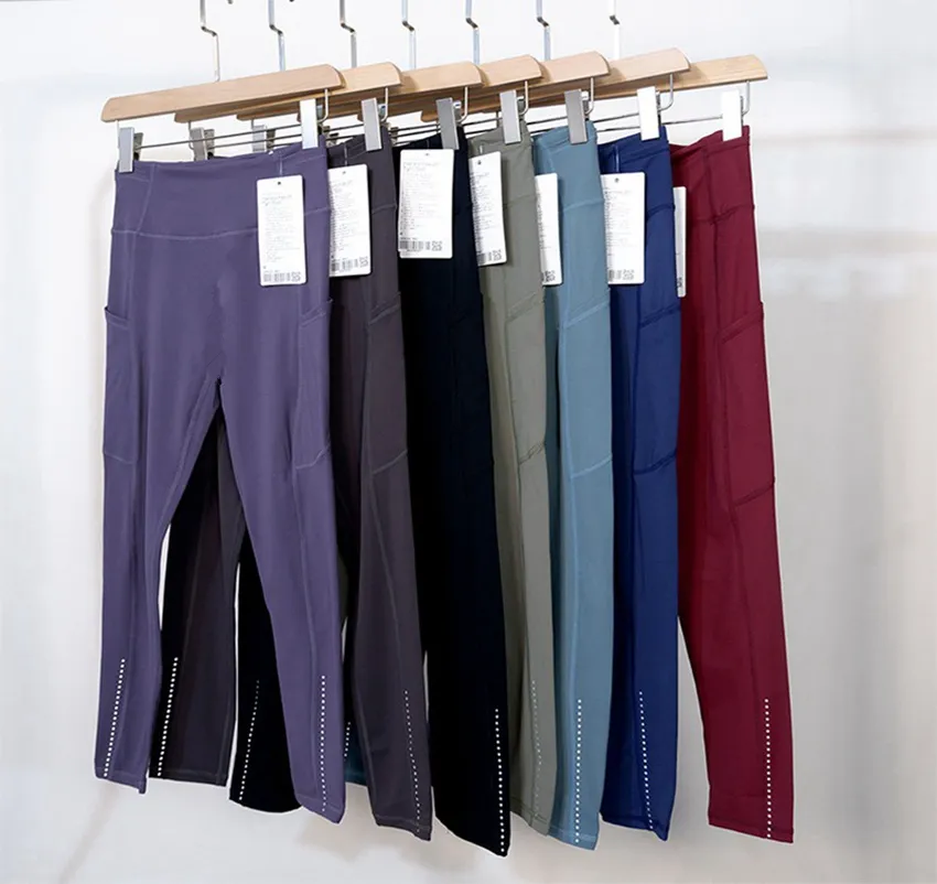 Les pantalons de yoga LU-008 alignent les collants multi-poche à taille haute brossée à double face coulant avec des cultures de points réfléchissantes