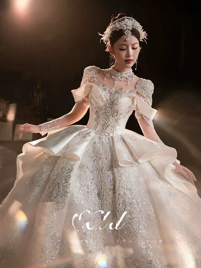 Saudi Arabic Princess Ball Gown most expensive wedding dress with Crystal Beading, Long Sleeves, Lace Sequins, and Appliques - Elegant Bridal Grobe Saudi Arabic Princess Ball Gown most expensive wedding dress with Crystal Beading, Long Sleeves, Lace Sequins, and Appliques - Elegant Bridal Grobe