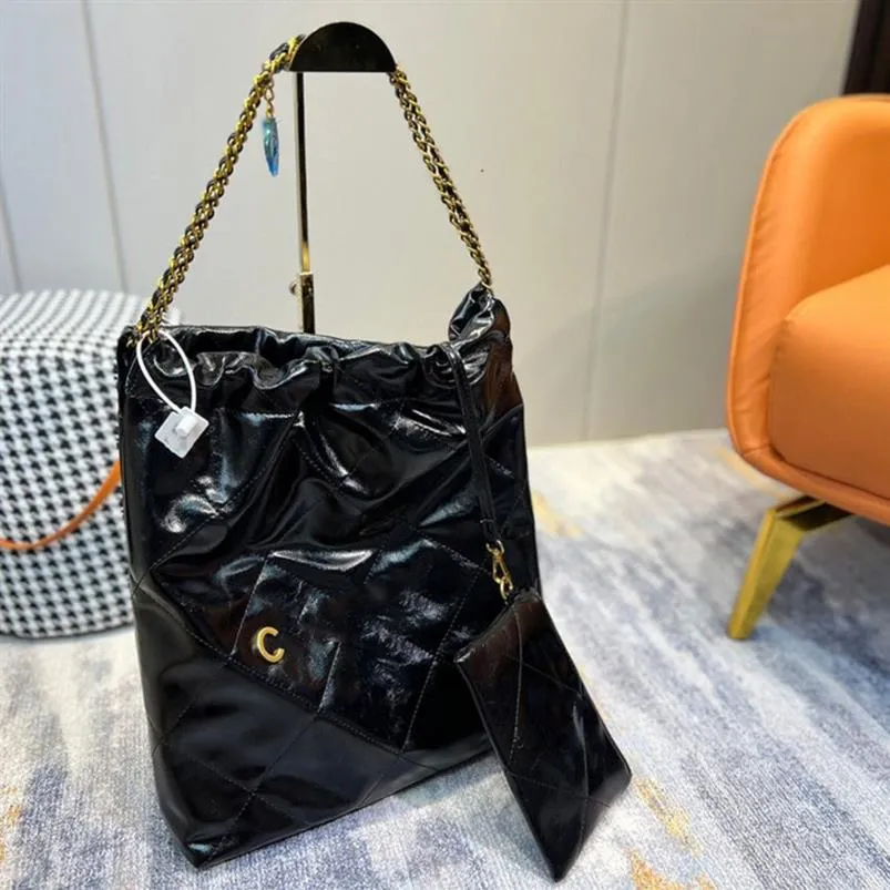 Lussi Designers Borsa da donna Borse modello diamante Tono oro Catena di metallo Zaini Designer Sacchetti della spazzatura felici 2022234f