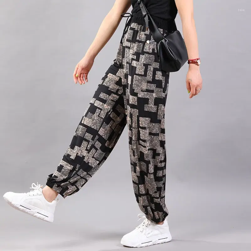 Pantaloni da donna Internet Famoso Seta del ghiaccio Lanterna Casual 2024 Moda Splicing Tasca in pizzo Plaid Stile Estero Gamba Legata Harlan