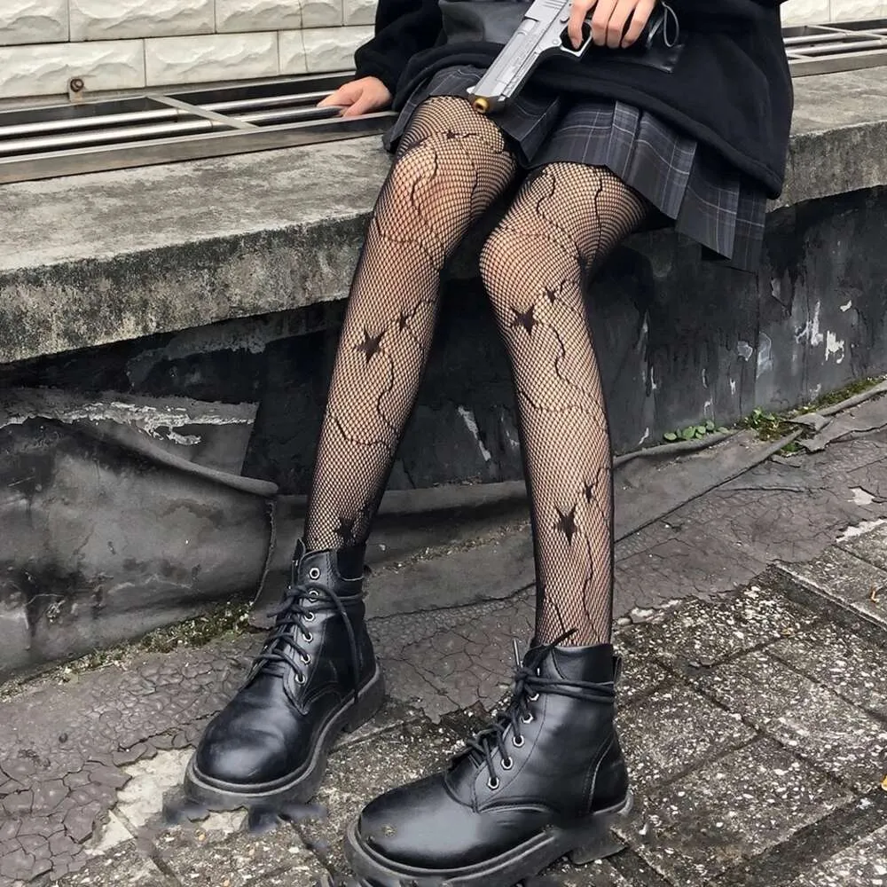 Designerin Frauenkleidung schwarze Seidenstrümpfe hohl jk sexy Frau Lmariner Lserreo Hosen Bogenfischer