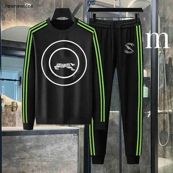 Designer hoodie män märke kläder för mens våren tracksuit mode cirkulär logotyp tryck långärmad man två bit set student byxor 30 jan