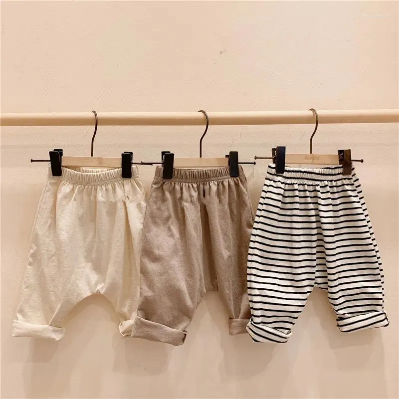 Byxor Bomullsbarn Byxor Spring och Autumn Boys Girls Casual Loose Pocket Baby Kids Clothing WTP37