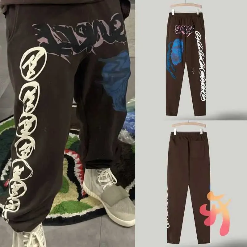 Rock Hip Hop Street Cactus Jack Sweatpants Foam Graffiti Letter Printed DrawstrGuard Pants For Men And Women From Kkefyea 23.48 DHgate.Com