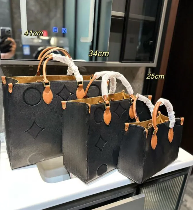På sprången stora emboss väska luxurys handväskor totes 41 cm 34 cm 25 cm onthego väska 10 färger väska lyxiga shoppingväskor toppkvalitet handväskor axel plånböcker