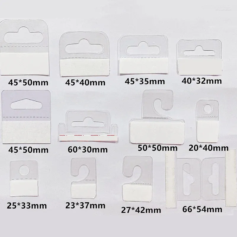 Hooks 100pcs PVC Slot Hole Hang Tabs Adhesive Tags Hook Plastic Merchandise Package Box Hanging Store Retail Display Home Storage