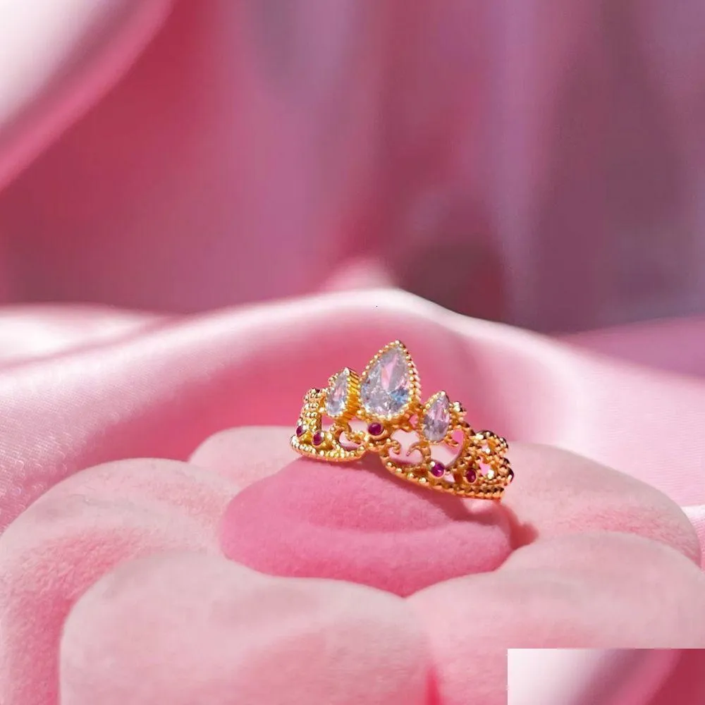 Bröllopsringar rapunzel kronprinsessring för kvinna mode geek smycken tillbehör guld pläterad justerbar gåva hennes 230920 drop del dhtdq