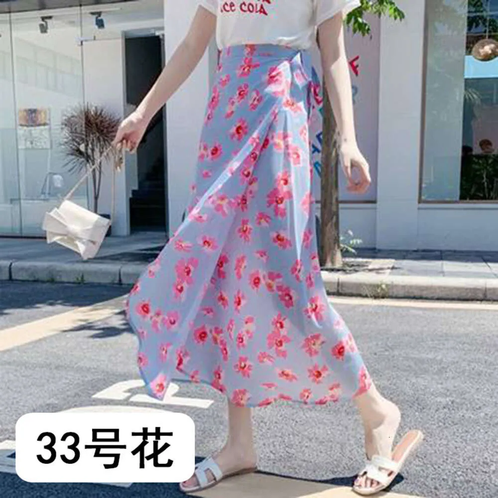 Vêtements pour femmes de créateurs Jupe florale Daisy pour vêtements d'été pour femmes 2024 nouvelle jupe à lacets taille haute pour jupe minceur en mousseline de soie une pièce enveloppée Jupe femmeSQIY