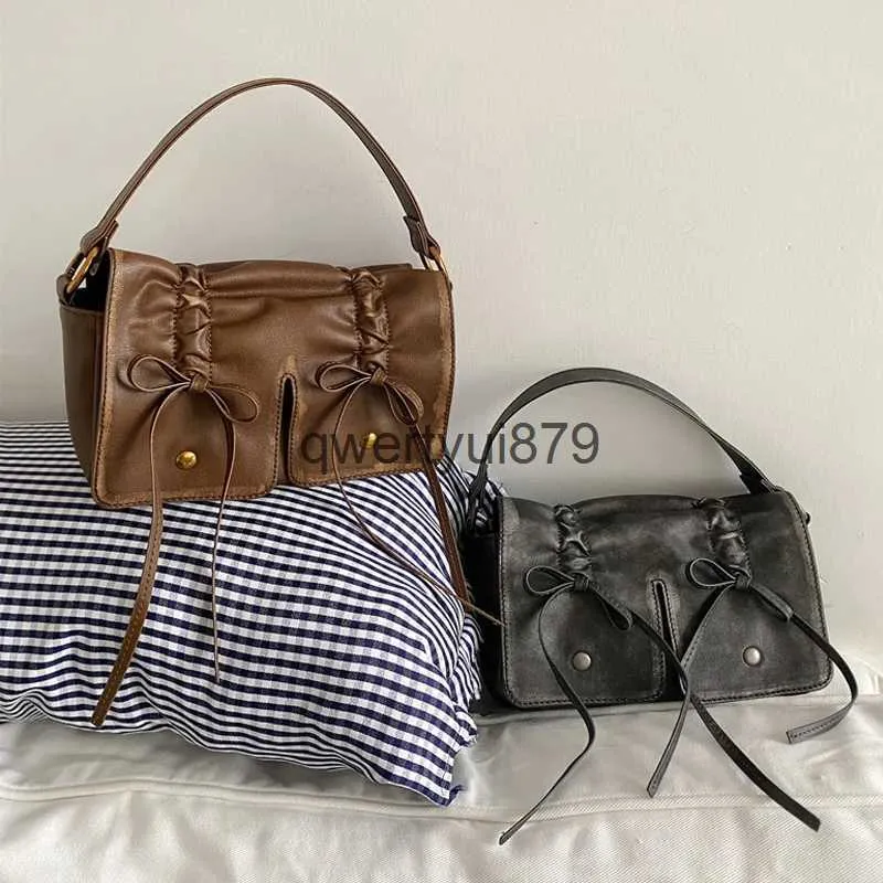 Totes Moto Biker Petits sacs carrés pour femmes Designer de luxe et sac à main 2023 Nouveau dans Vintage Plissé Bow Rivet Soulder CrossbodyH24131